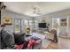 Comfortable living room featuring a decorative ceiling fan, plush furniture and lots of natural light at 160 Greenbelt Ct, Summerville, SC 29485