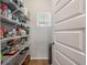 Organized pantry with ample shelving, showcasing storage solutions for all your kitchen essentials at 160 Greenbelt Ct, Summerville, SC 29485