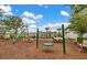 A vibrant playground featuring swings, slides, and climbing structures offers a fun recreational space for children at 160 Greenbelt Ct, Summerville, SC 29485