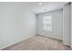 This simple bedroom provides neutral carpeting, one window for natural light and ample space at 166 Rosefield Ct, Summerville, SC 29485