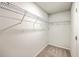Walk-in closet with hanging racks and neutral-colored carpeting at 166 Rosefield Ct, Summerville, SC 29485