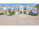 Charming townhomes feature colorful siding, well-manicured landscaping, and private driveways at 166 Rosefield Ct, Summerville, SC 29485