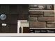 Selections of exterior materials, featuring roof shingles, stone veneer, paint samples, and trim details for the home at 168 Grange Cir, Summerville, SC 29486