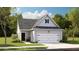 Charming single-story home with a gray exterior, attached garage, and well-manicured lawn at 193 Norse Bay, Summerville, SC 29486