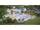Community pool area featuring lounge chairs, umbrellas, and lush landscaping at 193 Norse Bay, Summerville, SC 29486