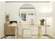 Home office with light wood desk, modern chair, decorative storage cabinet, and modern decor at 194 Norse Bay, Summerville, SC 29486