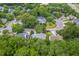 Aerial view of a neighborhood with mature trees and well-manicured lawns, showcasing the community's curb appeal at 1972 Gray Battery Ct, Mount Pleasant, SC 29464