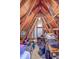 Unfinished attic storage space with wood framing and a variety of stored items at 1972 Gray Battery Ct, Mount Pleasant, SC 29464
