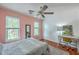 Bedroom with hardwood floors, warm natural light, and simple décor, creating a clean, relaxing retreat at 1972 Gray Battery Ct, Mount Pleasant, SC 29464