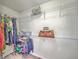 Spacious walk-in closet featuring ample shelving and rod space for organized storage and a warm carpet at 1972 Gray Battery Ct, Mount Pleasant, SC 29464