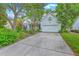 Attractive two-story home with mature landscaping and a concrete driveway leading to a two-car attached garage at 1972 Gray Battery Ct, Mount Pleasant, SC 29464
