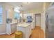 Well-lit kitchen area with stainless steel appliances and center island at 1972 Gray Battery Ct, Mount Pleasant, SC 29464