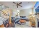 Spacious living room with view into dining area and stairwell at 1972 Gray Battery Ct, Mount Pleasant, SC 29464