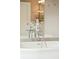 Elegant soaking tub featuring vintage-style fixtures and hardware, complemented by neutral decor and finishes at 2 Bedons Aly, Charleston, SC 29401
