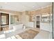 Spacious primary bathroom with soaking tub and double vanities at 2 Bedons Aly, Charleston, SC 29401
