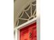 Close-up view of front door detailing its glass inlay at 2 Bedons Aly, Charleston, SC 29401