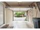 Clean garage with exposed brick and ample lighting at 2 Bedons Aly, Charleston, SC 29401