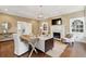 Spacious living room featuring a fireplace and windows, offering an inviting and cozy atmosphere at 2 Bedons Aly, Charleston, SC 29401