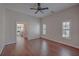 Spacious bedroom with hardwood floors, shuttered windows, and a view into a sitting room at 2036 Kings Gate Ln, Mount Pleasant, SC 29466