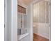 Well-organized entryway featuring a bench, storage, and a glimpse of the powder room at 2036 Kings Gate Ln, Mount Pleasant, SC 29466