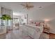 Serene main bedroom with a sitting area, hardwood floors, and a ceiling fan at 2036 Kings Gate Ln, Mount Pleasant, SC 29466
