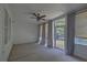 Covered sun room with ceiling fan, and lots of light coming in through the windows at 2036 Kings Gate Ln, Mount Pleasant, SC 29466