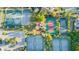 Overhead view of multiple well-maintained tennis courts with surrounding foliage and parking at 2036 Kings Gate Ln, Mount Pleasant, SC 29466