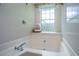 Bathroom featuring a large soaking tub and bright natural light at 207 Apache Dr, Summerville, SC 29483