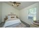 Cozy bedroom with ceiling fan, neutral colors, and comfortable furnishings at 207 Apache Dr, Summerville, SC 29483