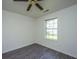 Bright bedroom featuring gray vinyl flooring and a ceiling fan at 207 Apache Dr, Summerville, SC 29483