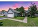 Charming single story home with landscaped front yard and attached two-car garage at 207 Apache Dr, Summerville, SC 29483