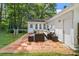 Backyard brick patio with an outdoor seating area and a view of the yard at 207 Terry Ave, Summerville, SC 29485