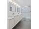 Modern bathroom featuring double sinks, modern lighting, and a large glass enclosed shower at 207 Terry Ave, Summerville, SC 29485
