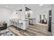 Modern kitchen with stainless steel appliances and a breakfast bar for casual dining at 207 Terry Ave, Summerville, SC 29485