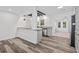 Modern kitchen with stainless steel appliances and a breakfast bar at 207 Terry Ave, Summerville, SC 29485