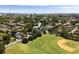 Explore 211 Line St. via an aerial shot, situated near green fields and surrounded by a picturesque cityscape under a clear sky at 211 Line St, Charleston, SC 29403