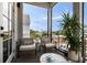 Cozy balcony with comfortable seating and city views, perfect for relaxing outdoors at 211 Line St, Charleston, SC 29403