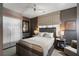 Comfortable bedroom featuring neutral tones, textured walls, and elegant furnishings at 211 Line St, Charleston, SC 29403