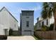 Contemporary home featuring gray siding and garage, blending modern design with comfortable living in a unique urban setting at 211 Line St, Charleston, SC 29403