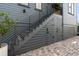 Home exterior featuring outdoor access from stairs to a screened deck with extra storage at 211 Line St, Charleston, SC 29403