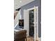 Living room area that features a stacked washer and dryer inside of a closet at 211 Line St, Charleston, SC 29403