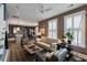 Bright living room with large windows, stylish furniture, and an open layout at 211 Line St, Charleston, SC 29403