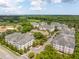 Community aerial view showcasing landscaping, community pool, and apartment buildings at 2244 Ashley Crossing Dr # 1125, Charleston, SC 29414