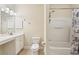 Bathroom with a vanity sink and a bathtub with a shower curtain at 2244 Ashley Crossing Dr # 1125, Charleston, SC 29414