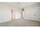 Neutral bedroom with carpet flooring and closet doors at 2244 Ashley Crossing Dr # 1125, Charleston, SC 29414