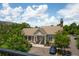 Spacious community clubhouse with lush landscaping, dedicated parking, and a covered entry at 2244 Ashley Crossing Dr # 1125, Charleston, SC 29414