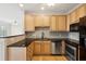 Efficient kitchen with granite counters and stainless steel appliances at 2244 Ashley Crossing Dr # 1125, Charleston, SC 29414