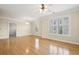 Bright living room with hardwood floors, crown molding, and a ceiling fan at 2244 Ashley Crossing Dr # 1125, Charleston, SC 29414
