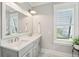 Well-lit bathroom features a double vanity, modern fixtures, and plenty of storage at 2313 Bucktail Ct, Mount Pleasant, SC 29466