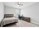 Serene bedroom featuring a comfortable bed, neutral decor, and ample natural light at 2313 Bucktail Ct, Mount Pleasant, SC 29466
